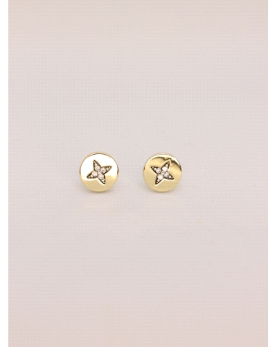 Pendientes de plata de ley ( 925) con laminas de oro.
Cierre de presión. Medida 8 mm de diametro.