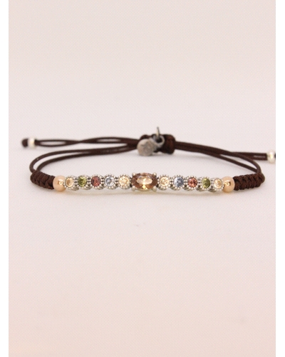 Pulsera de plata con cuarzo fumé central talla cabujón y espinelas de colores.
Ajustable a todas las medidas mediante cierre en