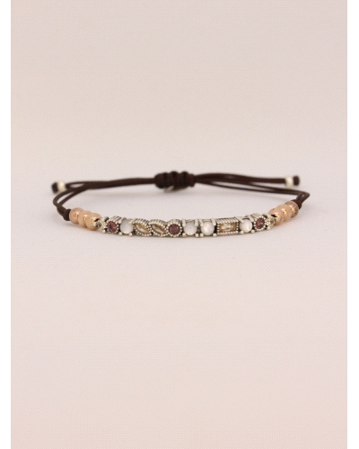 Pulsera de plata de ley con piedra natural nácar blanco y espinelas de colores.
Ajustable a todas las medidas mediante cierre e