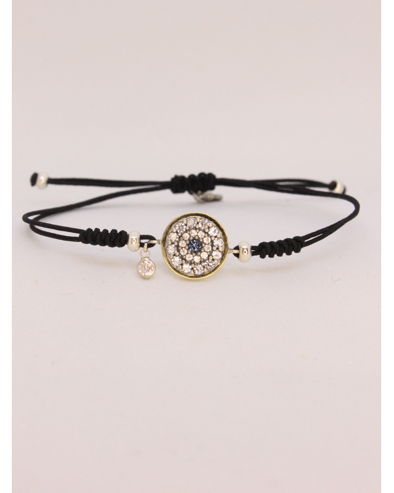 Pulsera de plata de ley con oro, espinelas blancas y azules.
Ajustable a todas las medidas mediante cierre en forma de nudo cor