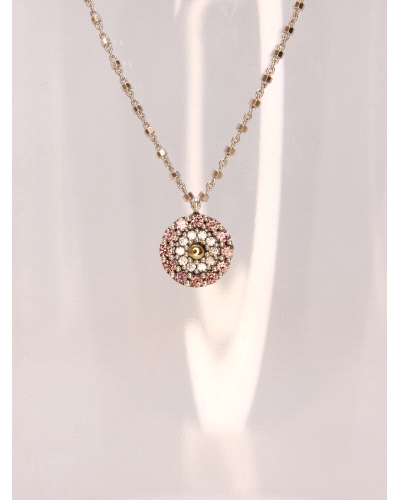 Colgante con centro de oro macizo, plata de ley, espinela blanca y granate.