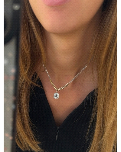 Collar de plata de ley con eslabones dorados. Espinelas blancas y cuarzo hidrotermal azul.