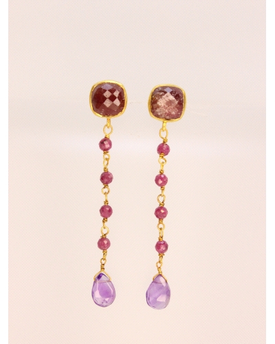 <P>Pendientes de plata de primera ley (925) con baño de oro amarillo y piedras en color fucsia y morado.</P>
<P>Cierre de presi