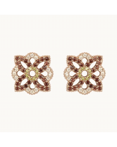 <P>Pendientes de plata de ley (925) con baño de oro rosa y circonitas en color, verde, marrón y champán.</P>
<P>Cierre de presi