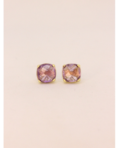 <P>Pendientes de plata ( 925) con baño de oro amarillo y circonita en color morado.</P>
<P>Cierre de presión.</P>
<P>Medida: 8