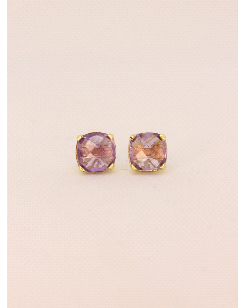 <P>Pendientes de plata ( 925) con baño de oro amarillo y circonita en color morado.</P>
<P>Cierre de presión.</P>
<P>Medida: 8