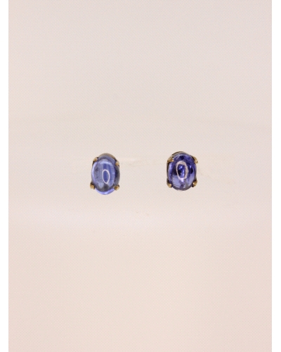 <P>Pendientes de plata (925) con baño de oro amarillo y circonita de color azul intenso.</P><BR>
<P>Cierre de presión.</P><BR>
