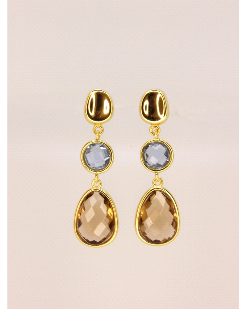 Pendientes de plata de primera ley (925) con baño de oro amarillo y circonitas en color azul y marrón.

Cierre de presión.

