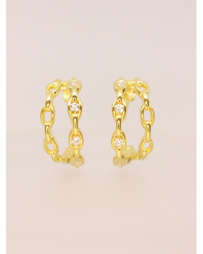 <P>Pendientes de plata de primera ley (925) bañados en oro amarillo de 18kt con circonita blanca.</P>
<P>Cierre de presión.</P>