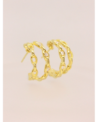 <P>Pendientes de plata de primera ley (925) bañados en oro amarillo de 18kt con circonita blanca.</P>
<P>Cierre de presión.</P>