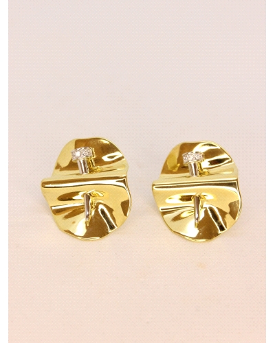 <P>Pendientes de plata de primera ley (925) con baño de rodio y chapado en oro amarillo de 18kt con circonita blanca.</P>
<P>Ci