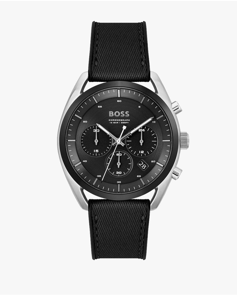 Presenta una caja redonda de acero inoxidable de aproximadamente 44 mm de diámetro con esfera negra, acompañada de una correa de