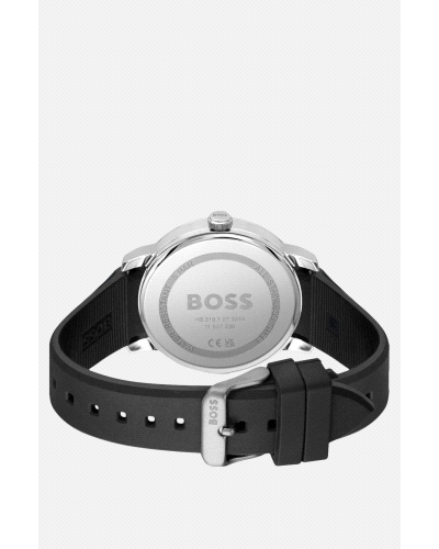 Presenta una caja redonda de acero inoxidable de aproximadamente 44 mm de diámetro con esfera negra, acompañada de una correa de