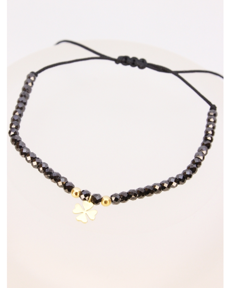 Pulsera de oro amarillo de primera ley (750) trébol&nbsp;con espinela negra. ( medida extensible: de 15 a 23 cm)