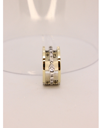 <P>Anillo de plata de ley (925) y láminas de oro macizo. </P>
<P>Espinelas blancas.</P>
<P>Si necesitas una talla distinta a l