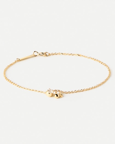 Pulsera de plata bañada en oro con circonita blanca y dos colgantes