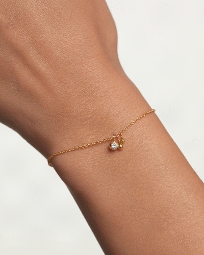 Pulsera de plata bañada en oro con circonita blanca y dos colgantes