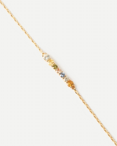 Pulsera de plata bañada en oro con un set ondulado de circonitas multicolores
