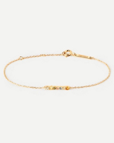 Pulsera de plata bañada en oro con un set ondulado de circonitas multicolores