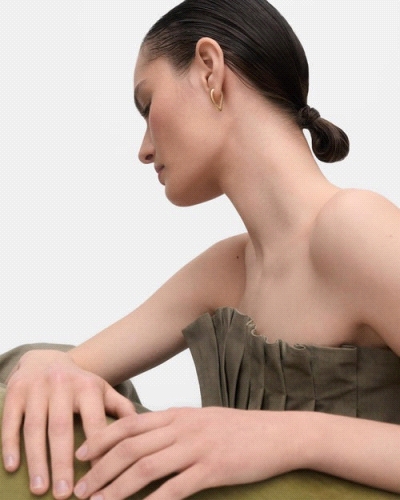 Aros geométricos con forma ovalada asimétrica