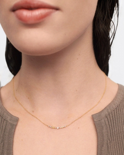 Collar cadena adornado con circonitas multicolor con tamaños y formas diferentes