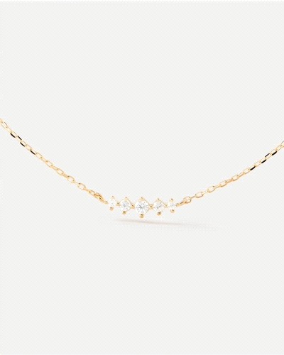 Collar elegante adornado con cinco circonitas blancas.