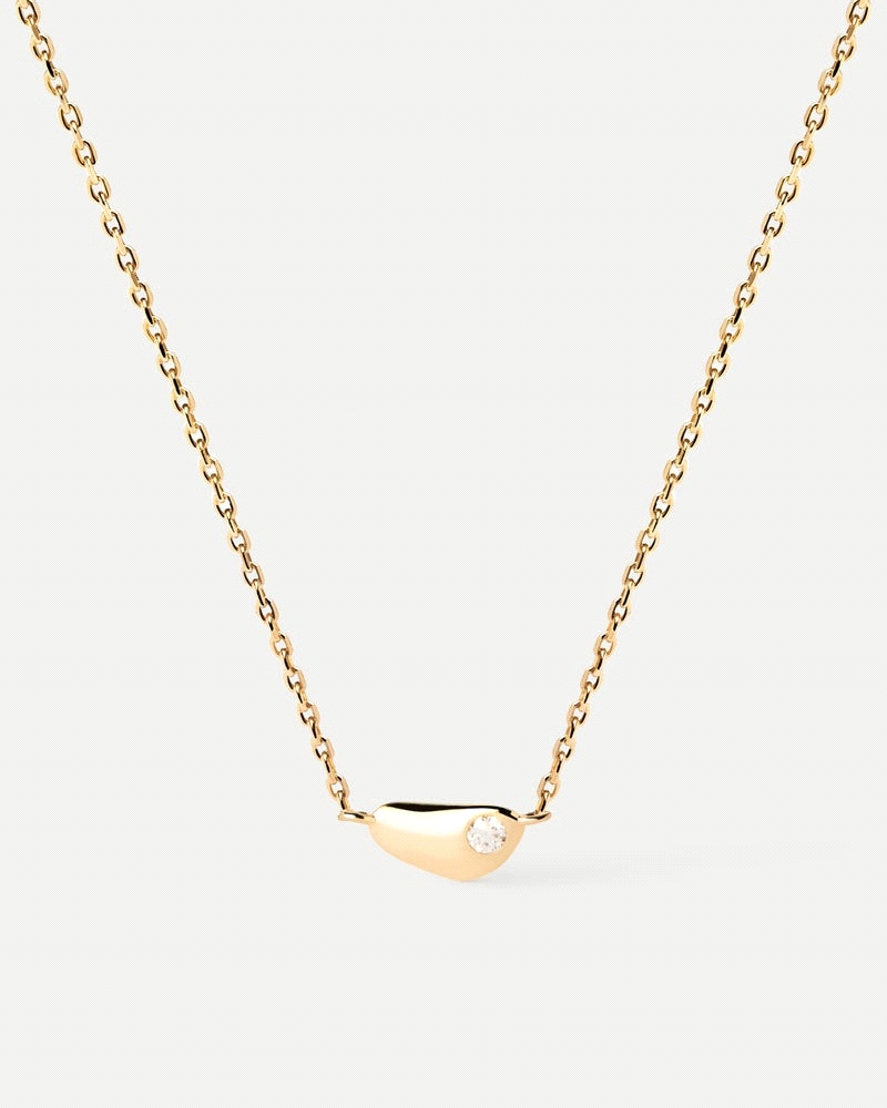 Anillo abierto fluido adornado con perla cultivada de agua dulce.