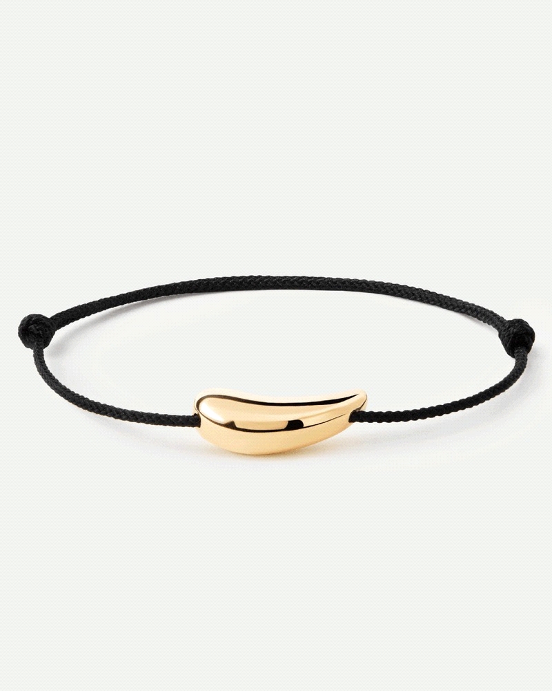 Pulsera de cordón negro ajustable con diseño de gota.