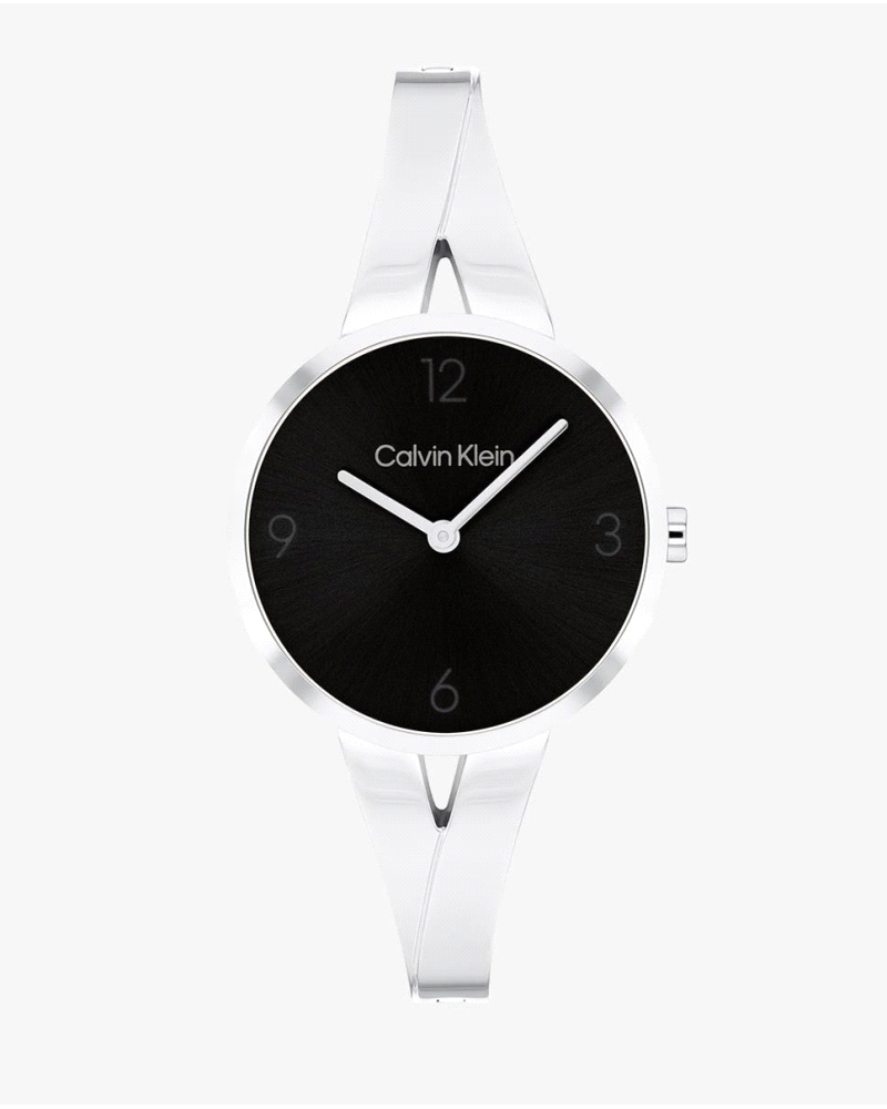 El Calvin Klein CK 25100026 Joyful es un reloj de cuarzo para mujer en acero inoxidable plateado, con caja redonda de 30 mm, esf