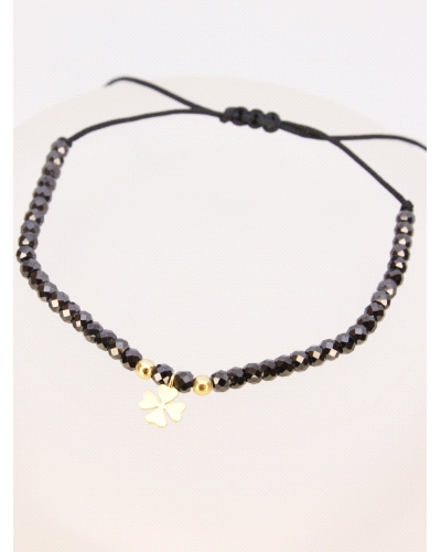 Pulsera de oro amarillo de primera ley (750) trébol&nbsp;con espinela negra. ( medida extensible: de 15 a 23 cm)