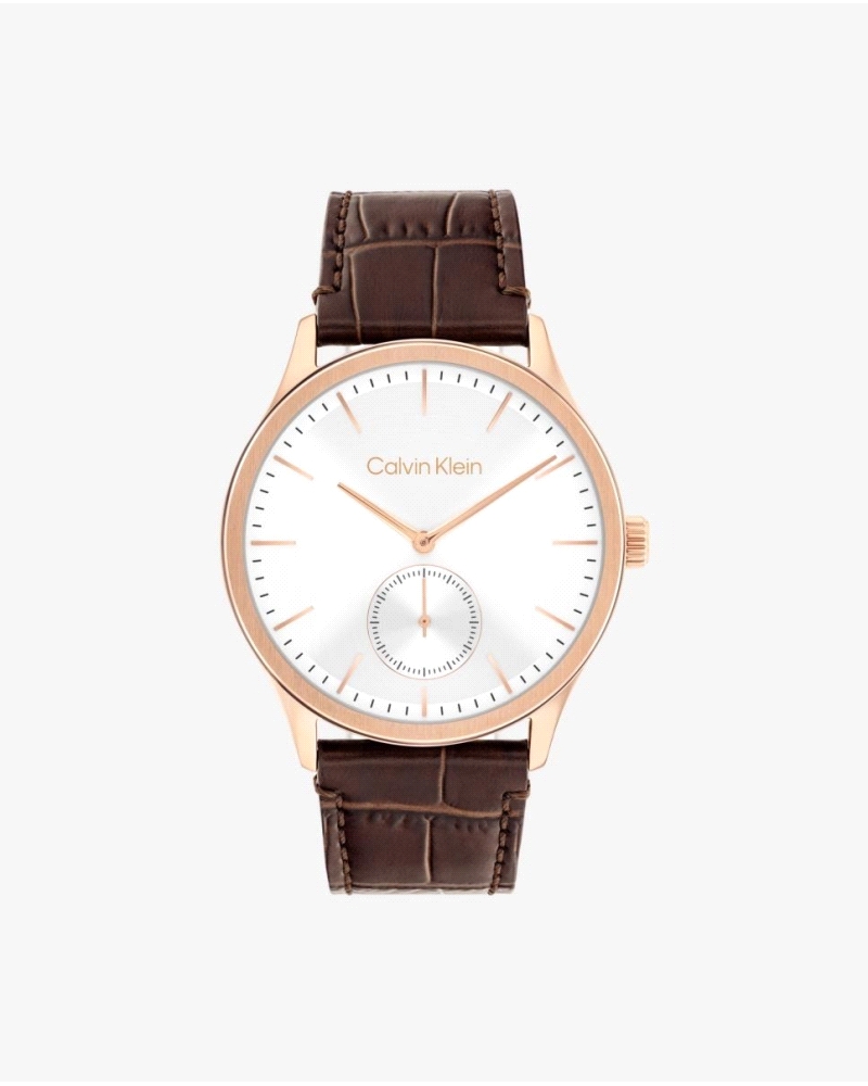 El CK 25200553 es un reloj de cuarzo para hombre con caja de acero oro rosa de 42 mm, esfera blanca, cristal mineral, correa de 