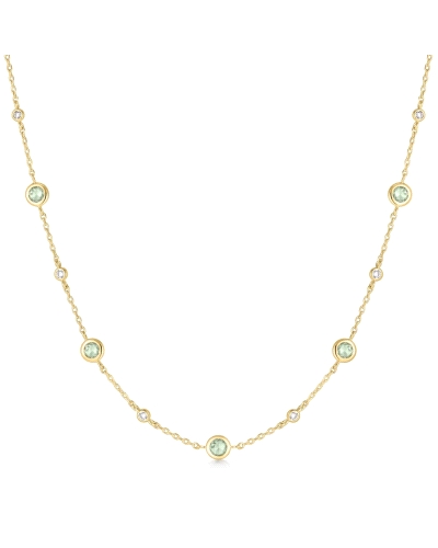 Collar de plata dorada con detalles en verde menta y blanco.
